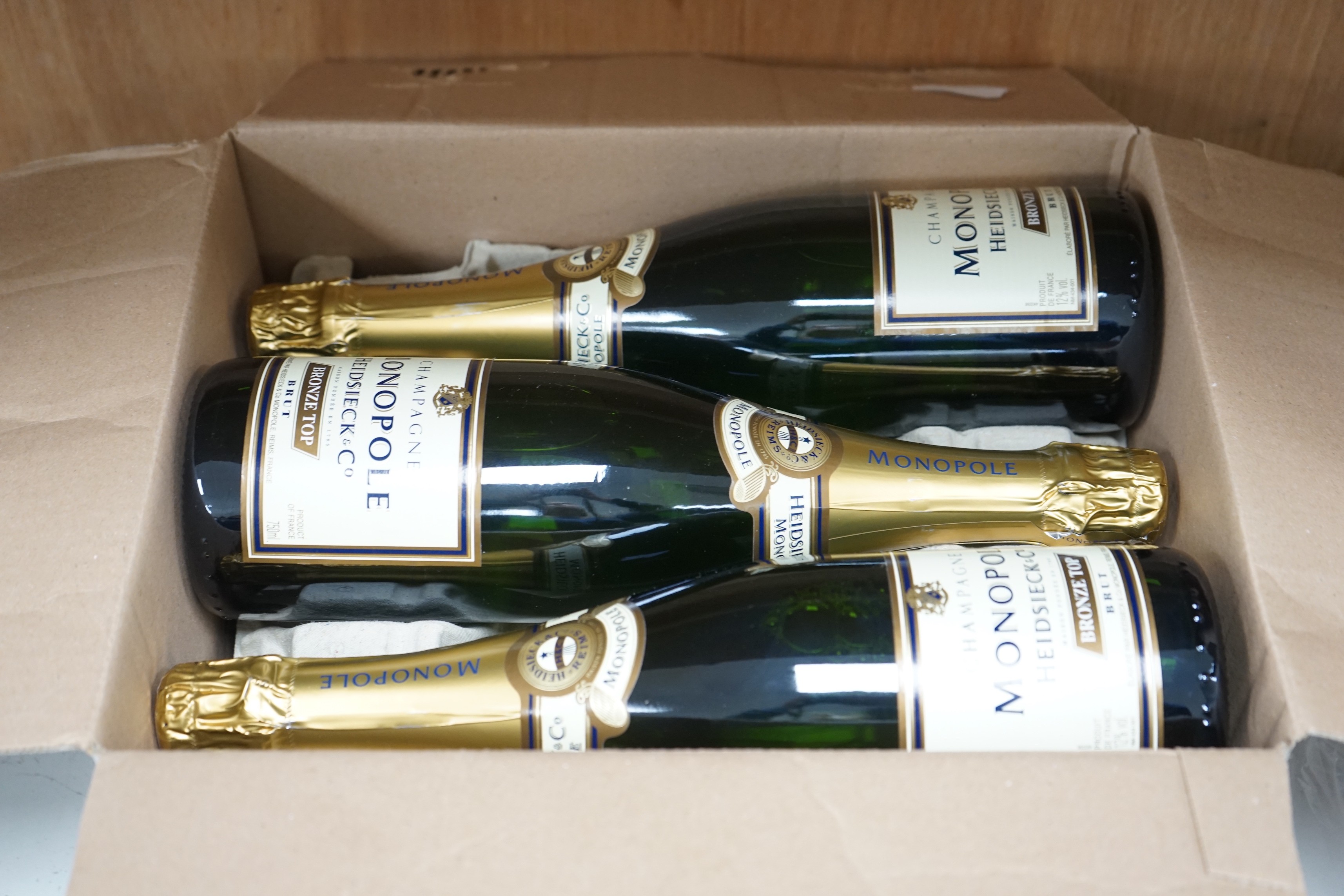 Six bottles of Monopole Heidsieck & Co NV champagne